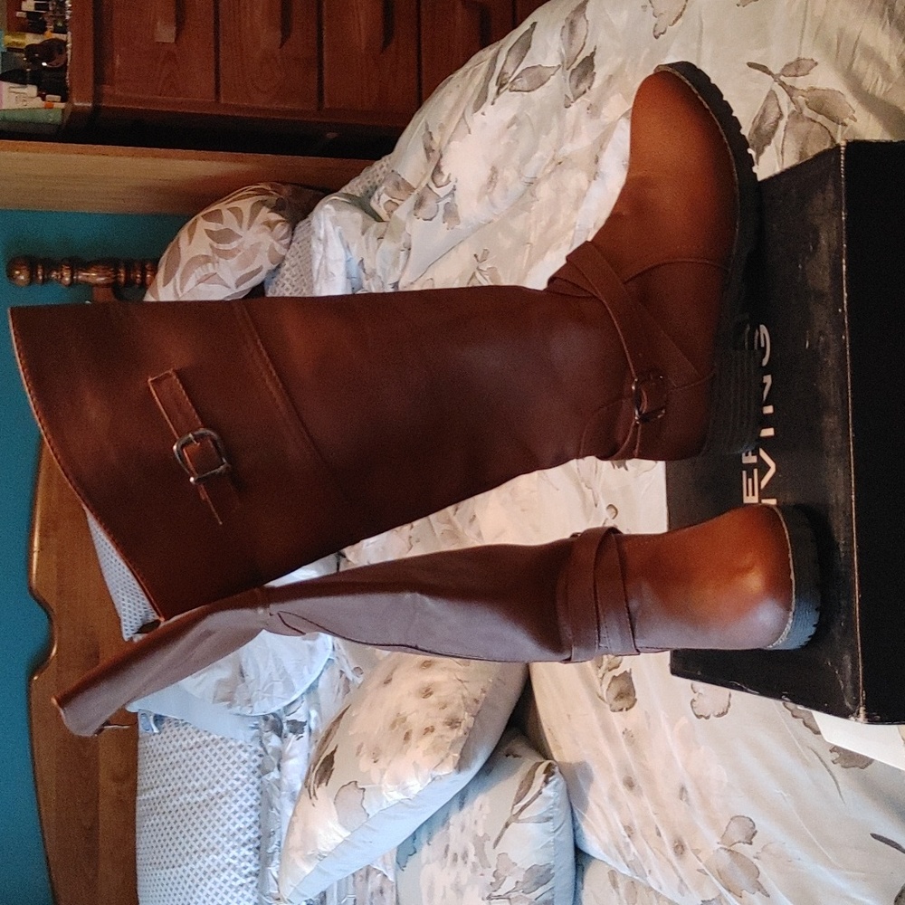 Tall 1 in heel almost knee high boots. Brand new